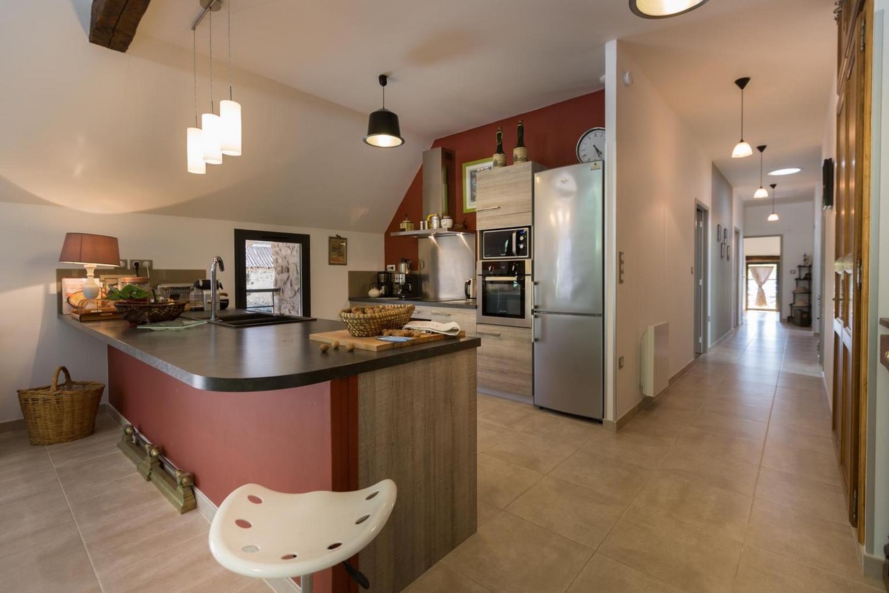 Modern kitchen with island and full-sized appliances